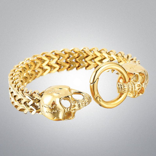 Bracelet biker à maille cubaine ouvert avec crânes fêlés en acier inoxydable pour homme - fermoir anneau lobster - coloris or