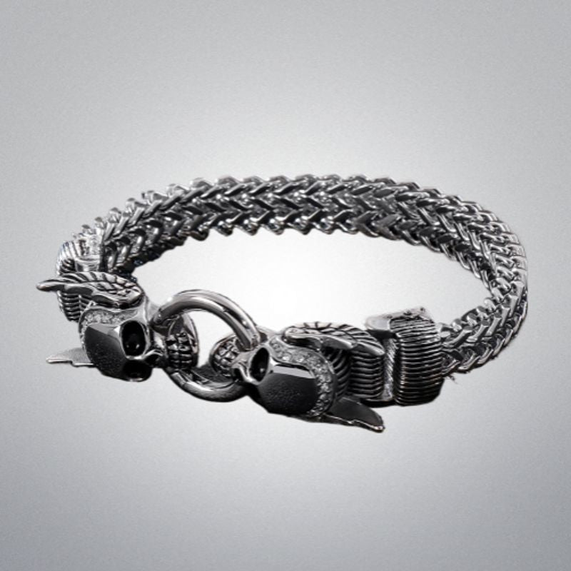Bracelet biker à maille cubaine avec crânes et ailes d'ange en acier inoxydable pour homme avec fermoir mousqueton lobster de couleur argent