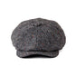 Vu de face de la casquette irlandaise Bulger - Béret à visière avec chevrons mouchetés en laine mélangée de qualité - homme élégant - coloris gris anthracite