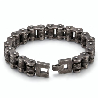 Bracelet Kross chaîne moto acier rétro forme ouverte fermoir clip sécurisé largeur treize millimètres.