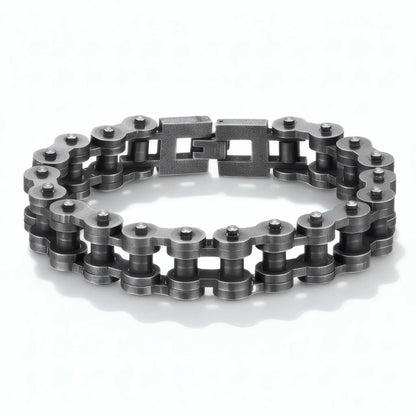 Bracelet chaîne moto en acier rétro Kardan avec maillons effet chaîne de transmission posé sur fond blanc