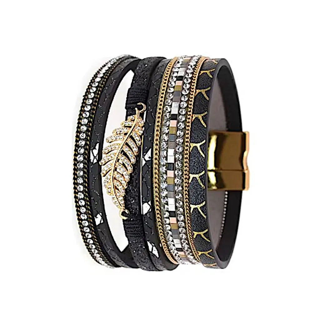 Bracelet Fougère noir multi-rangs en cuir microfibre, vue de profil, feuille dorée centrale et finitions strass sur plusieurs rangs.