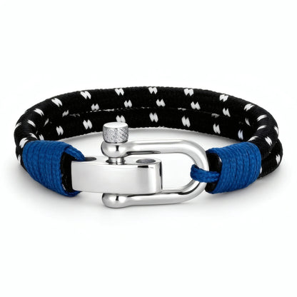 Bracelet cordon noir moucheté blanc Nautis fermoir manille acier liens finition bleu marine.
