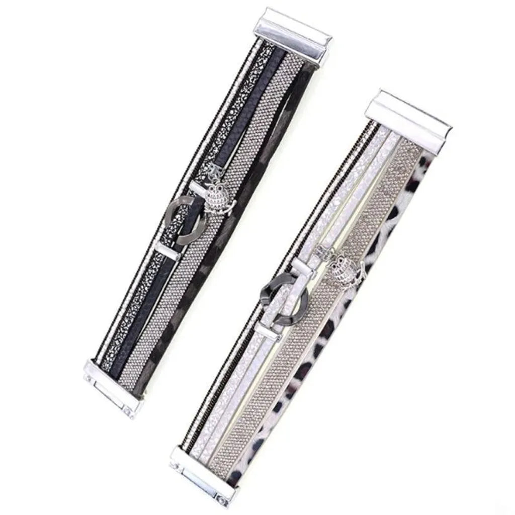 Bracelet Hibou multi-rangs en cuir microfibre, vue à plat : deux coloris noir et blanc, rondelle centrale métal, bande léopard fine.