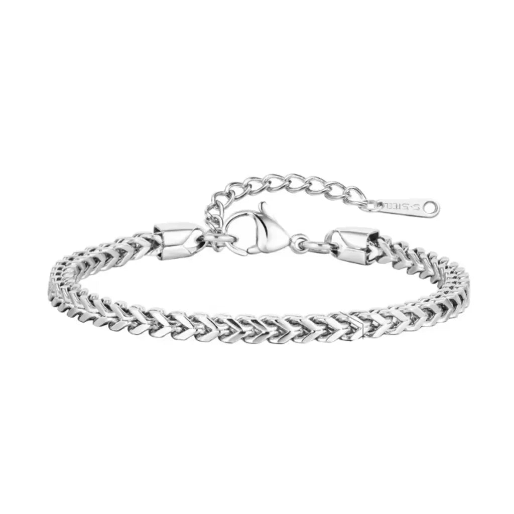 Bracelet Icaro en version argentée, maille carrée régulière et brillance froide, posé à plat pour mettre en valeur le poli miroir de l’acier inoxydable.