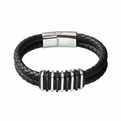 Packshot fond blanc. Le bracelet Link cuir tressé noir et ses segments modulaires en acier inoxydable bi-ton. Le symbole de la force et de l'assemblage structurel.