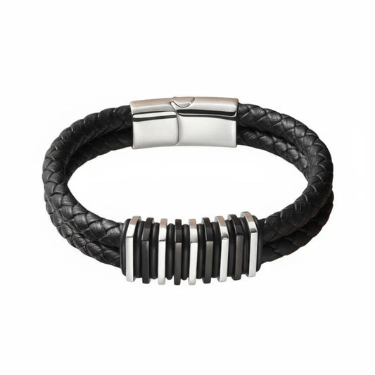 Packshot fond blanc. Le bracelet Link cuir tressé noir et ses segments modulaires en acier inoxydable bi-ton. Le symbole de la force et de l'assemblage structurel.