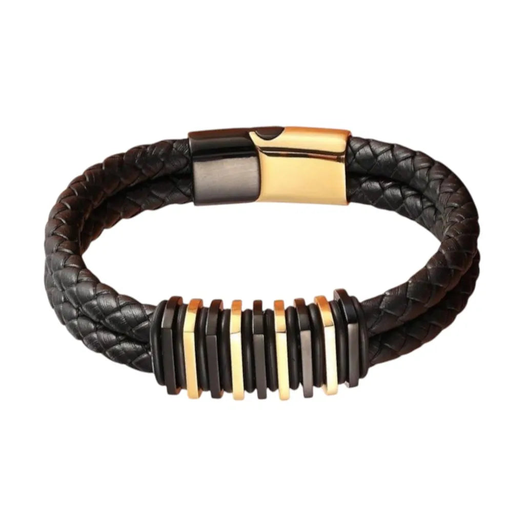 Vue produit premium. Le bracelet Link à double cuir tressé noir avec ses segments modulaires noir et or. L'esthétique de la structure modulaire technique.