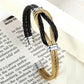 Bracelet manchette nœud de boucles entrelacées à câble en acier inoxydable - coloris noir et or