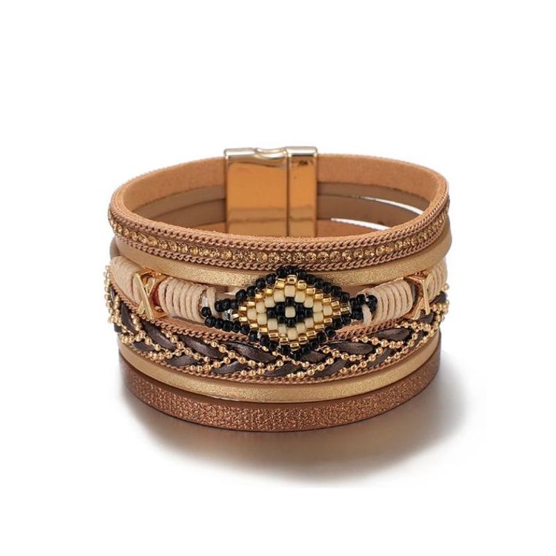 Bracelet mauvais œil en perles Miyuki, wrap bohème multilanière en cuir Pu pour femme avec fermoir doré magnétique - coloris beige.