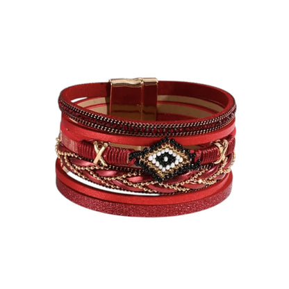 Bracelet Œil du Chaman en cuir microfibre rouge, multi-rangs décorés de perles pony beads et strass, motif œil central, fermoir magnétique inspiration amérindienne.