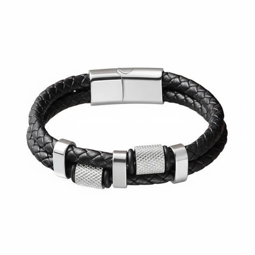 Packshot fond blanc. Le bracelet Talon cuir tressé noir et ses cylindres moletés en acier inoxydable poli. Le symbole de la précision mécanique et du grip industriel.