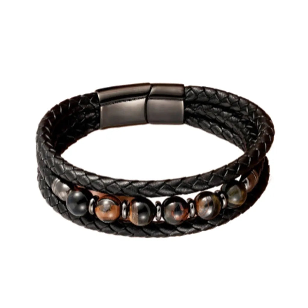 Bracelet multilanière noir en cuir  pour homme avec perles de pierre oeil de tigre - coloris bleu.