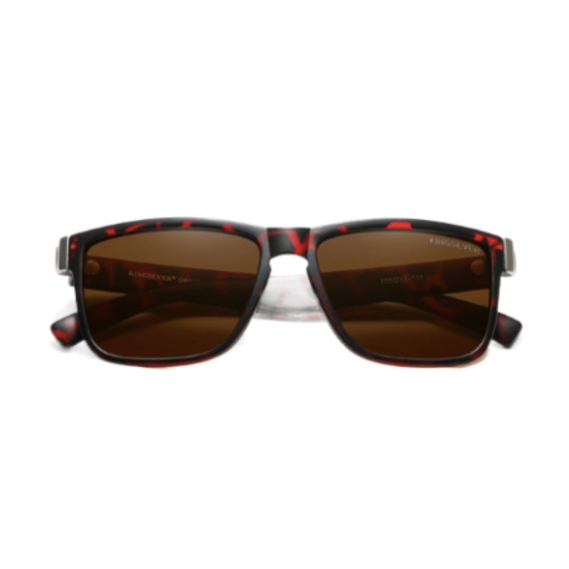 lunettes de soleil voyageur Kepa Urbain avec verres carres polarisés reposant sur sa monture voyageur vue de face, lunettes pliées sur de larges branches incurvées - unisex e