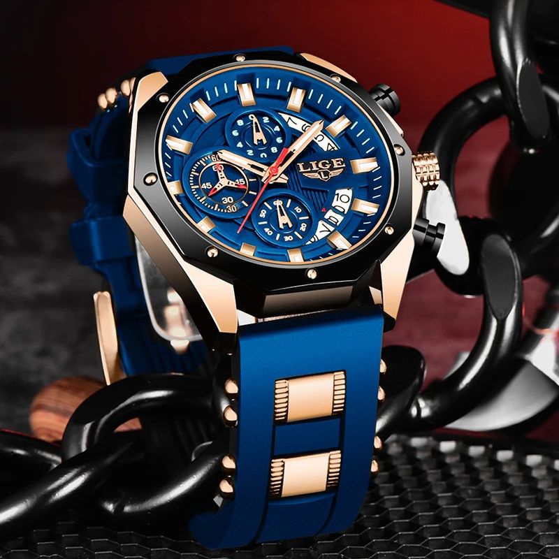 Montre chronographe pour homme dressé sur un support nid d'abeille en plastique noir  montre sport avec grand cadran bleu, sa lunette décagone est ses poussoirs sont noir, son boitier, ses aiguilles, sa couronne et sa boucle ardillon sont de couleur or, son bracelet souple en silicone est bleu - Lige OceanMaster