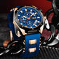 Montre chronographe pour homme dressé sur un support nid d'abeille en plastique noir  montre sport avec grand cadran bleu, sa lunette décagone est ses poussoirs sont noir, son boitier, ses aiguilles, sa couronne et sa boucle ardillon sont de couleur or, son bracelet souple en silicone est bleu - Lige OceanMaster