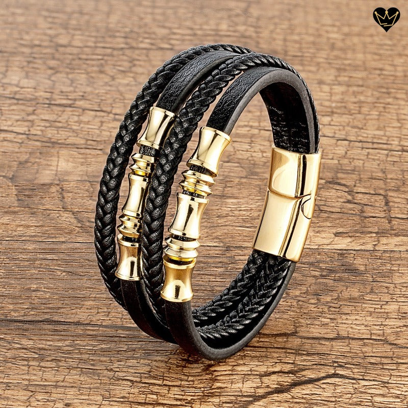 Bracelet multilanière lanières lisses et cordons tressés en cuir noir avec perles diabolo et fermoir magnétique en acier inoxydable - coloris or